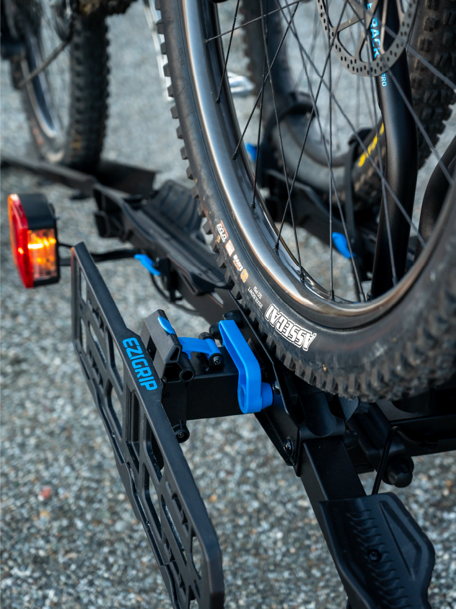 A close view of the Ezigrip E-Rack 2 Pro clearly showing how the rack guides the front wheel of an ebike along while it is being loaded