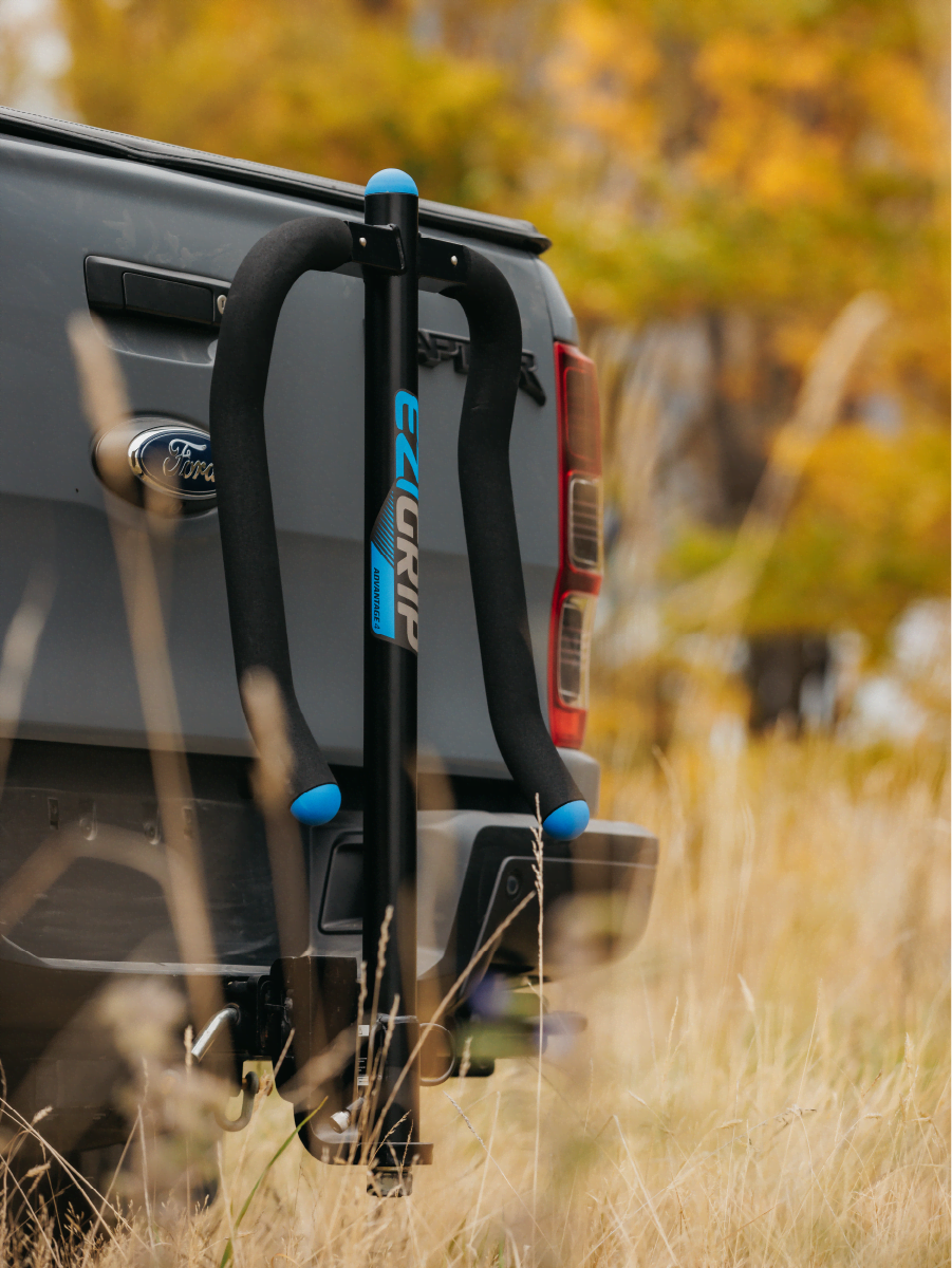 An advantage 2 bike rack is on the back of ford ranger with the arms stowed down neatly
