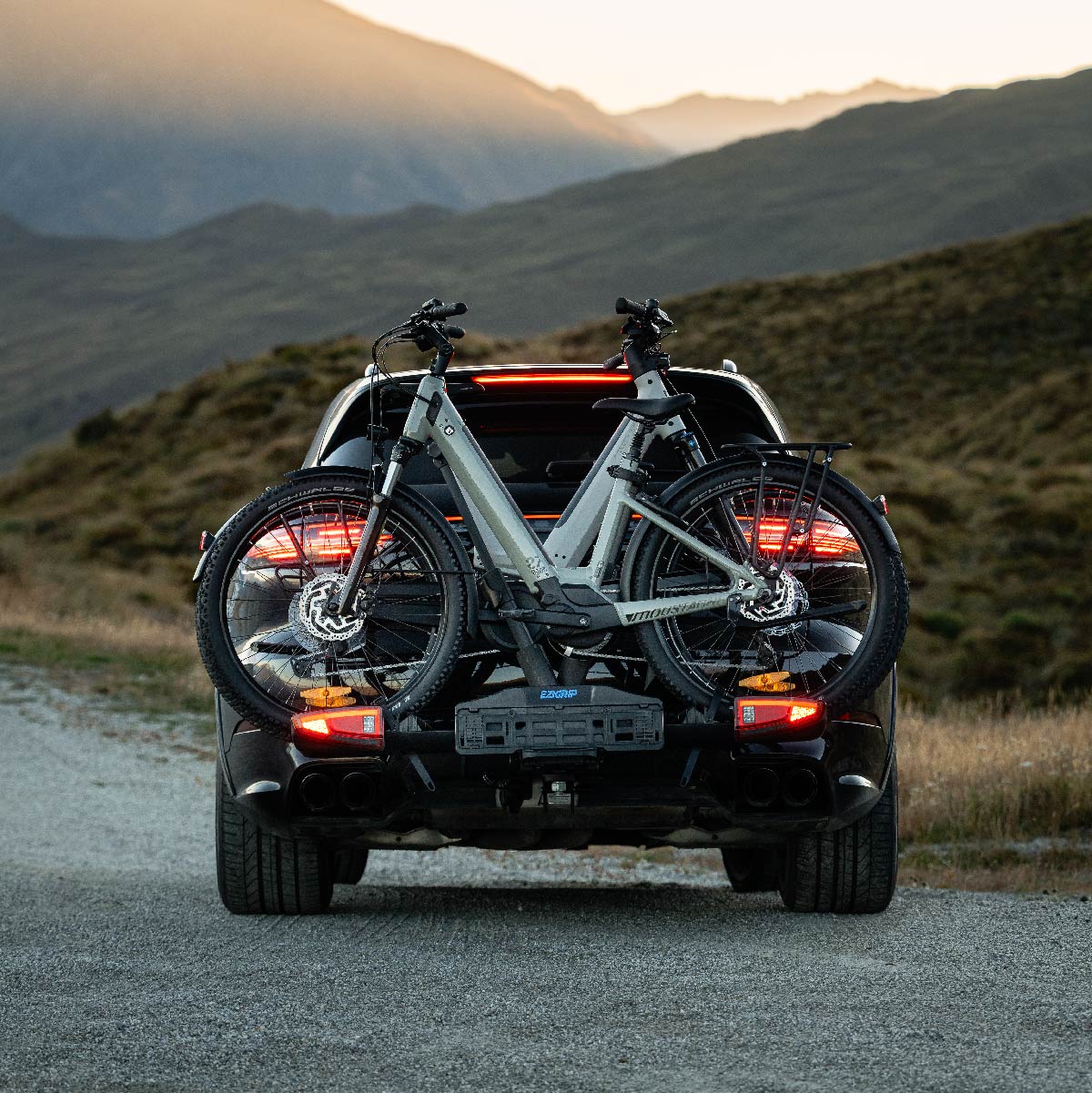 two step through bikes mounted to an ezigrip evolve 2 bike rack