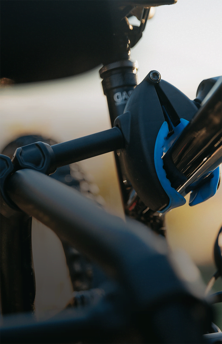 A close view of the frame clamp of the Ezigrip E-Rack 2 bike rack clamped to the frame of an electric bike