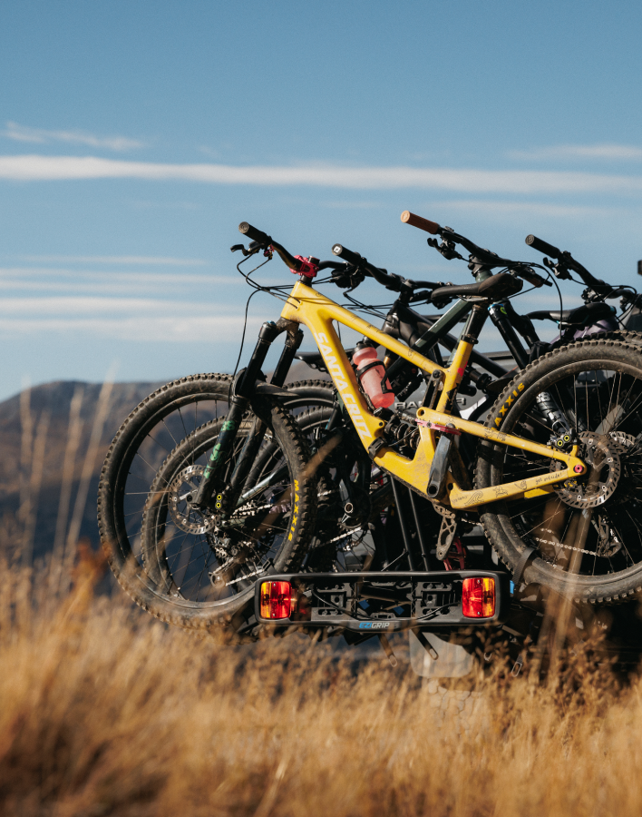 A view of 4 mountain bikes strapped to an Ezigrip Enduro 4 platform bike rack